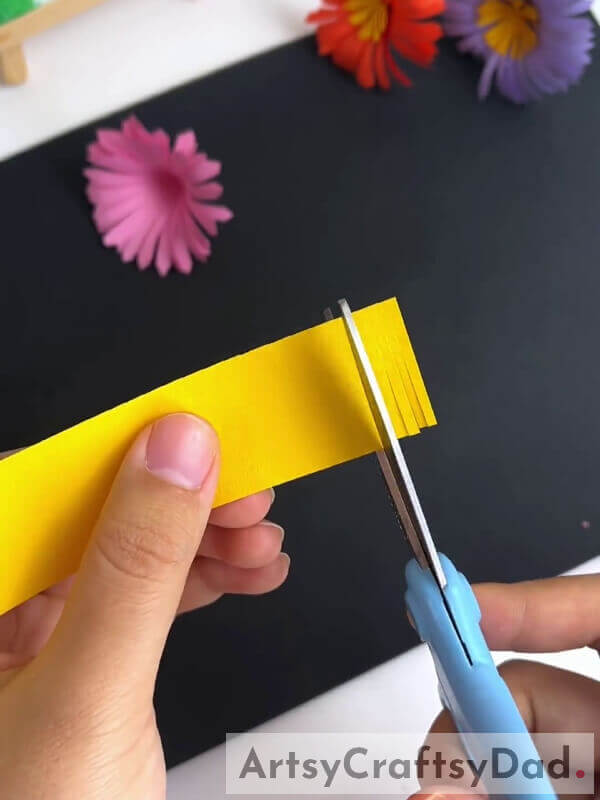 Cutting Yellow Color Craft Paper To Create Pollen- Detailed Guide to Crafting Artificial Flowers with Paper Cutting