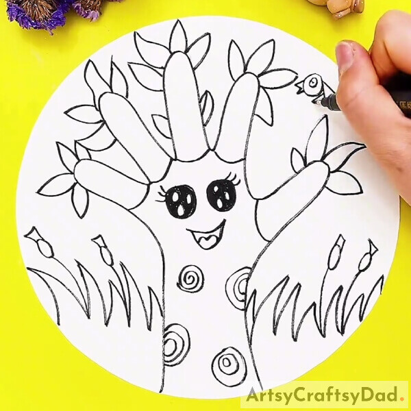 Drawing A Bird- A tutorial for beginners to help them draw a sweet tree with a hand outline. 