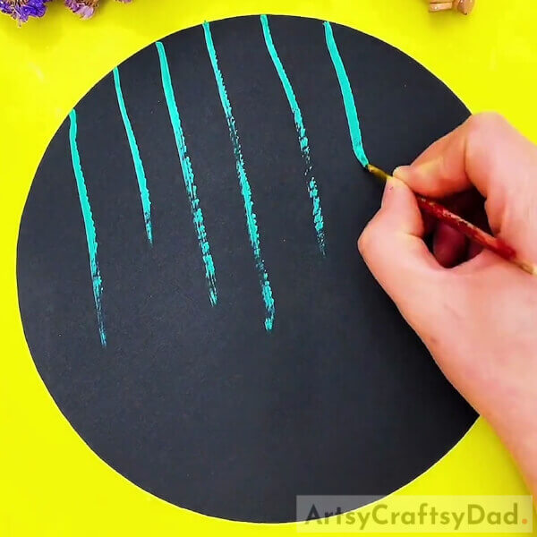 Drawing Green Stems On Black Color Craft Paper- Wistera Painting Instructions for Children 
