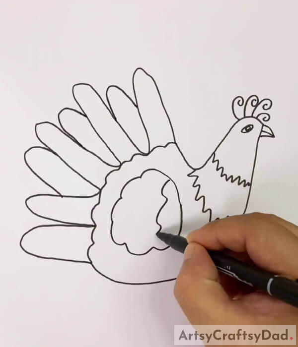Drawing Its Features- Step-by-Step Guide to Creating a Hand Outline Peacock for Kids