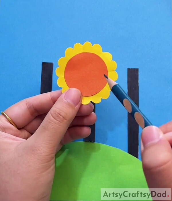 Drawing Lines In Orange Paper To Create Pollen- Designing a Sunny Day Sunflower Paper Craft