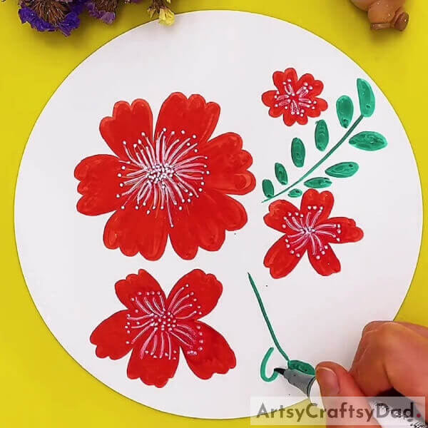 Drawing Poppy Flower Leaves Using Green Marker- A walkthrough for kids to illustrate a red poppy flower