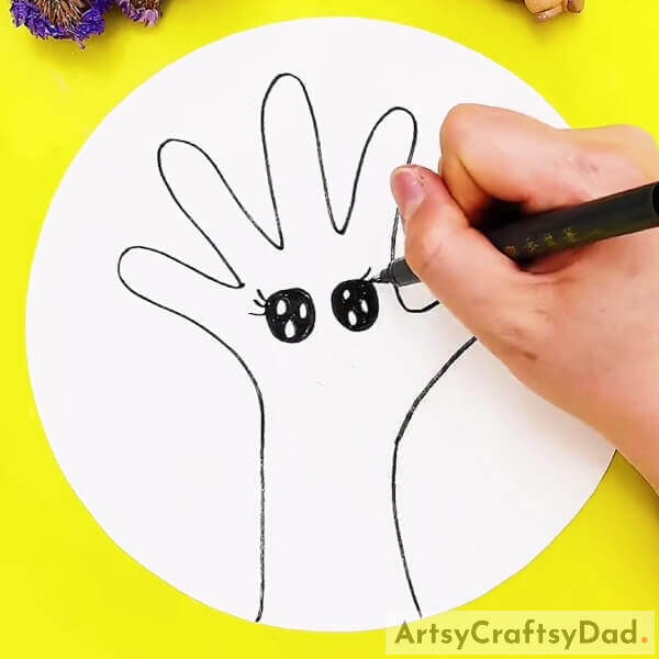 Drawing The Eyes- A guide on drawing a delightful tree using a hand silhouette for beginners. 