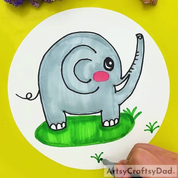 Drawing The Grass- Instructing Children in the Art of Drawing an Elephant Utilizing Hand Movements