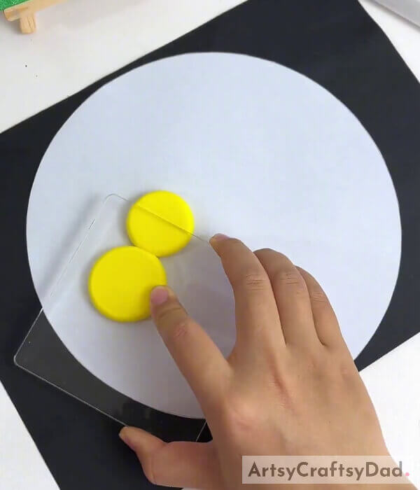 Flattening The Clay Balls- Creative Chicks: Tissue and Clay Making Tutorial