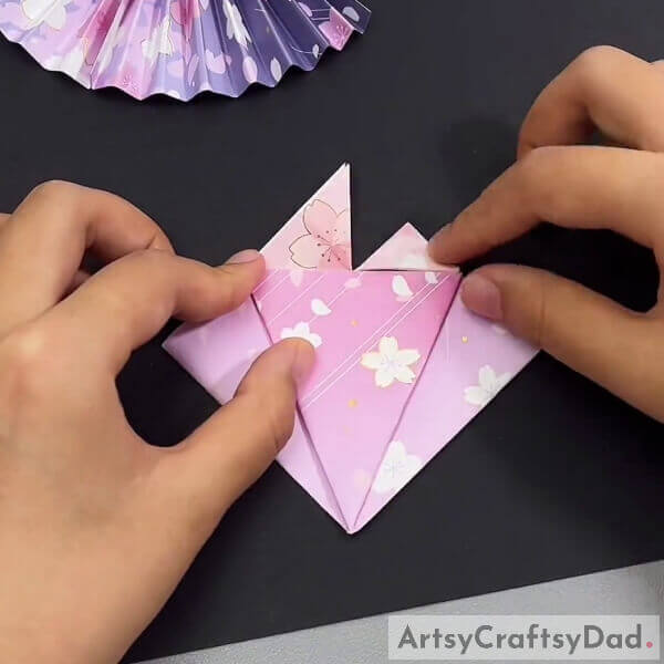 Flipping And Folding The Right Top End- Crafting a Dress from Origami Paper - A Tutorial