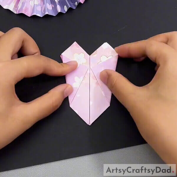 Flipping And Folding The Side Corners- Crafting a Dress with Origami Paper - A Tutorial