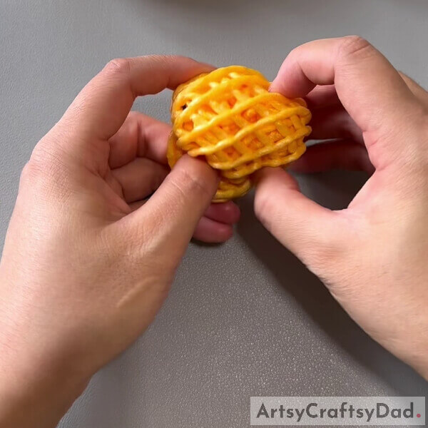 Folding and Secure- Step-by-Step Guide for Kindergartners to Make a Fruit Foam Net Pineapple Model 