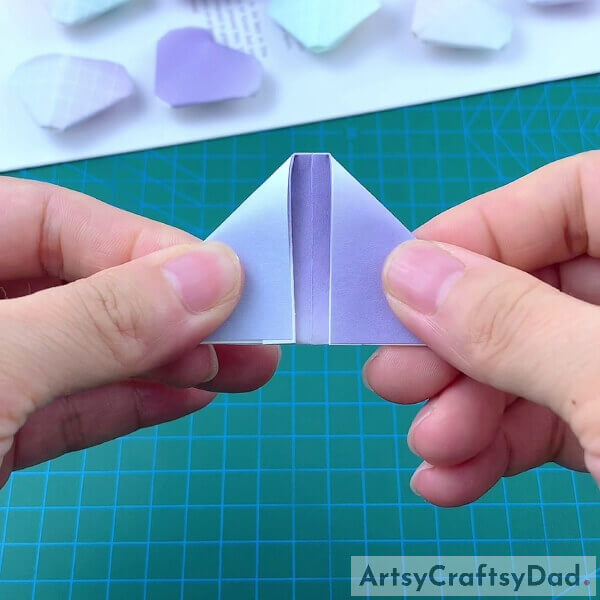 Folding Origami Craft Paper Diagonally- Learning to construct a paper heart origami designed for youngsters