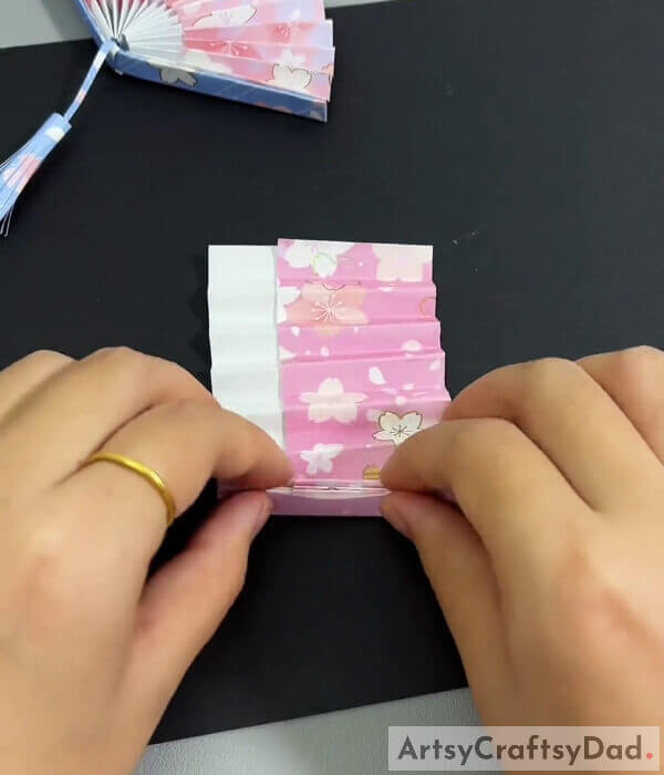 Folding Our Origami Paper In Zig Zag Manner Again- How to Craft a Chinese Fan Using Paper - A Tutorial for Beginners 
