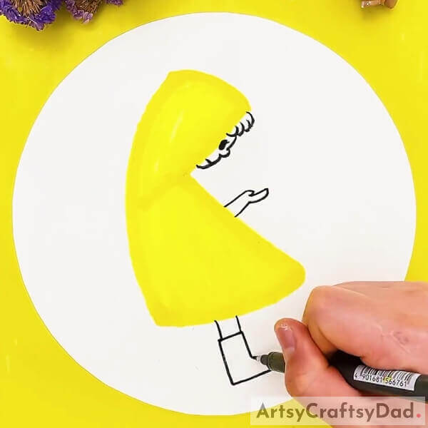 Making A Boy- Learn to draw a child in a raincoat during a rainy day with this guide for kids.