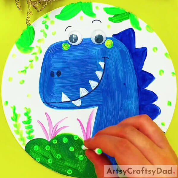 Making Dots Over The Painting- How To Produce a Cute Dinosaur Picture Through Stamping For Kids 