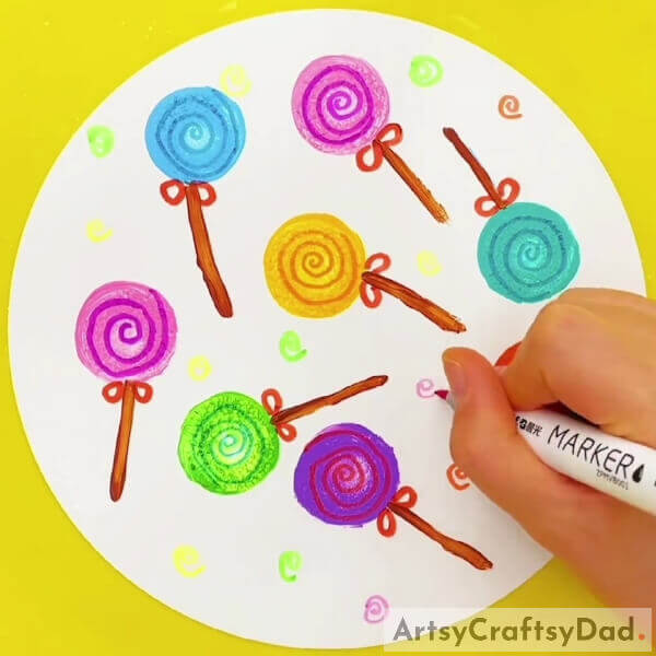 Making Small Spirals On The Base- Learn the technique for creating a colorful lollipop stamp painting and drawing 