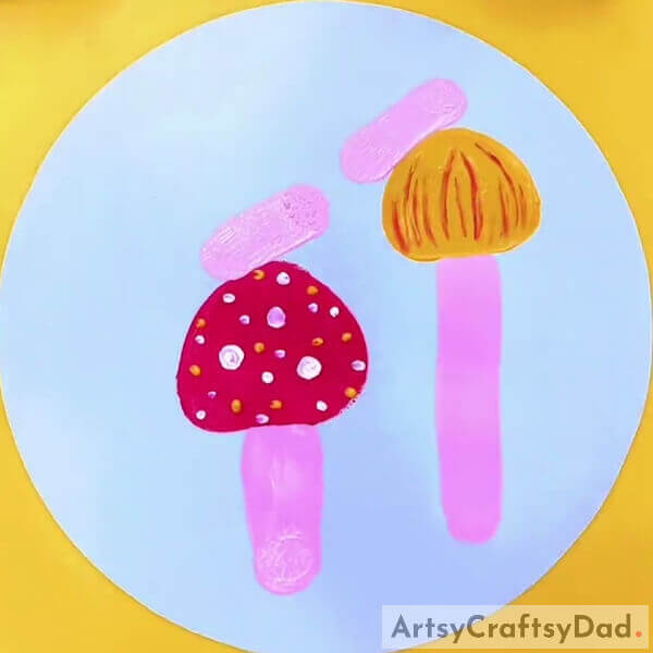 Making Snails' Bodies- How to use stamps to paint a Mushroom Garden image, a guide for the young ones.