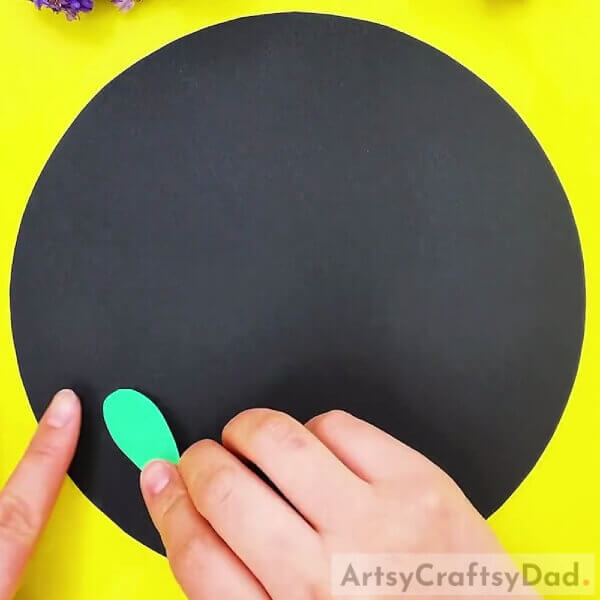 Pasting A Leaf Cutout- Fantastic Clay Snails On Leaves Craft For Kids
