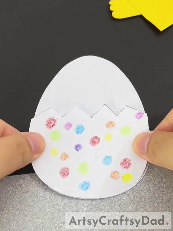 Pasting Both Paper Eggs Together-Learn how to make chicks using paper with this fun tutorial