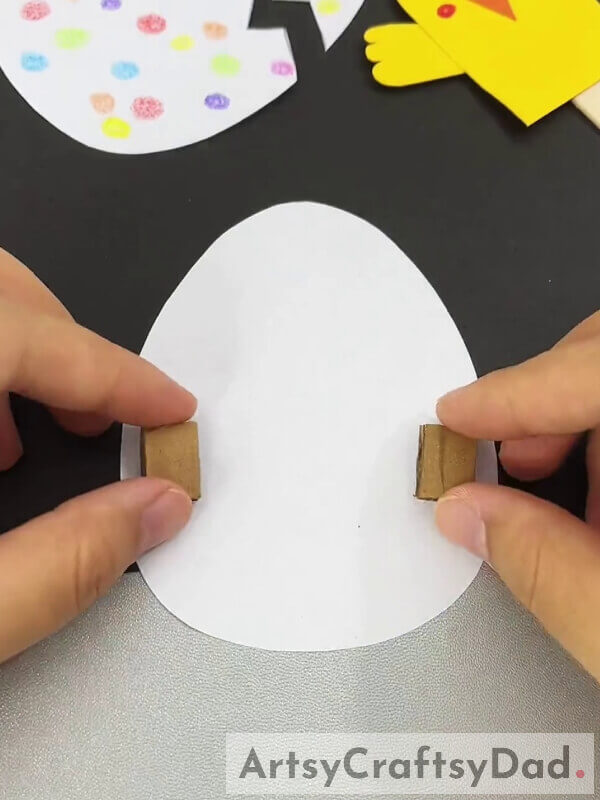 Pasting Cardboard Pieces With Egg-A fun tutorial to hatch chicks with paper