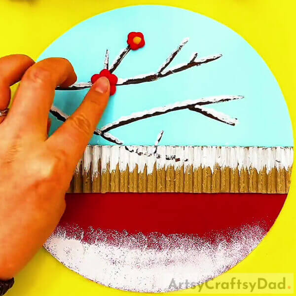 Pasting Flowers Using Red Color Clay- An Instructional Guide for a Winter Cherry Blossom Artwork