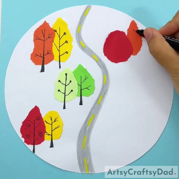 Pasting More Colorful Paper And Drawing Branches- Learn how to make paper tearing art in the woods