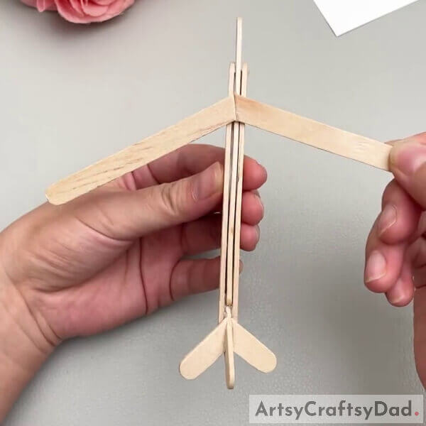 Pasting The Wings To The Body- Tutorial to put together a popsicle stick aeroplane