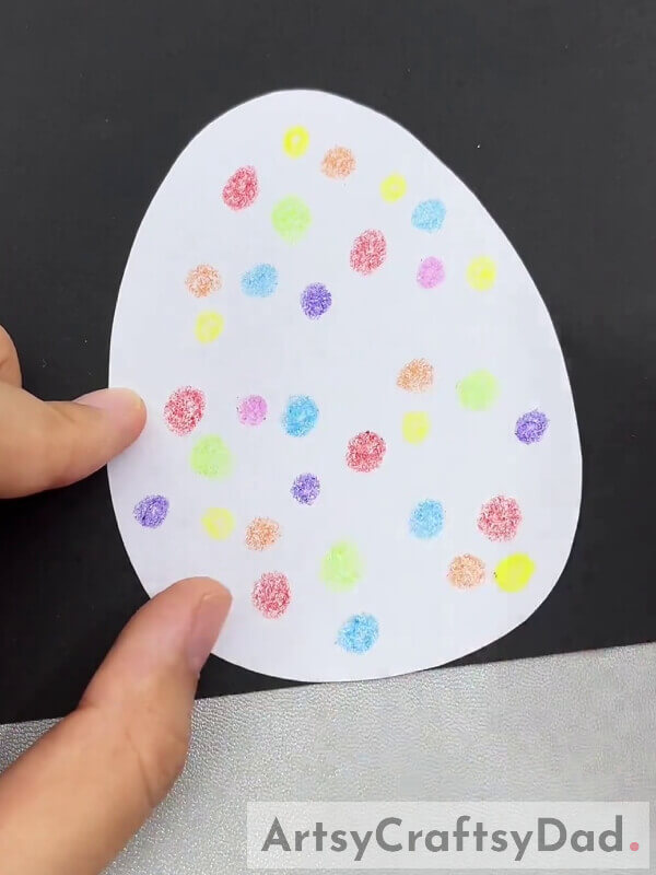 Putting More Color Dots On Our Paper Egg- Tutorial to Aid in Crafting a Chick Hatch Paper Craft For Little Ones 