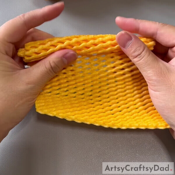 Rolling The Fruit Foam Net- Creating a Foam Net Pineapple Model for Kindergartners 
