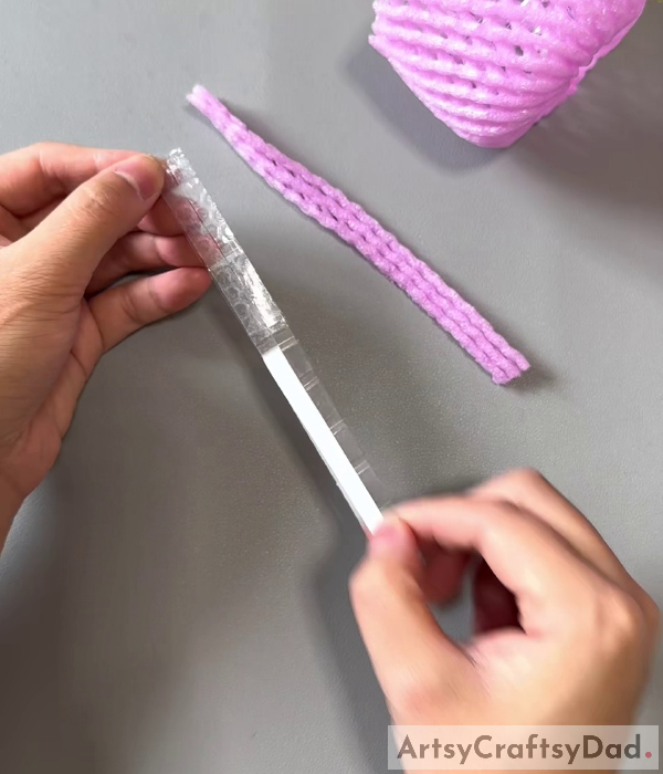 Tape Is Applied- Tutorial for Crafting a Flower Basket with Recycled Materials