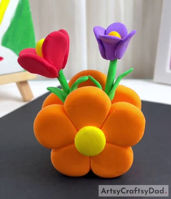 This Is The Final Look Of Your Clay Flower Vase With Flowers- Instruction on Designing a Clay Flower Vase for Novice Crafters 
