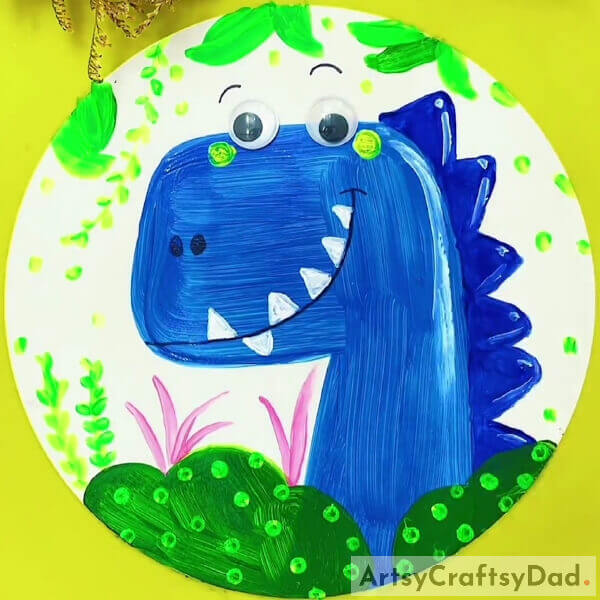 This Is The Final Look Of Your Dinosaur Face Painting!- Learn To Make a Delightful Dinosaur Stamp Painting For Little Ones 