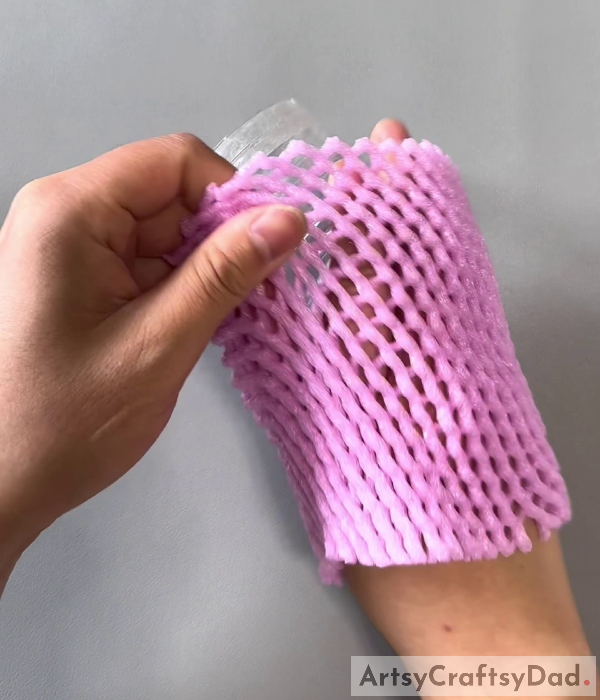Wrapping The Fruit Foam Net-How to Make a Fruit Foam Net and Plastic Bottle Basket