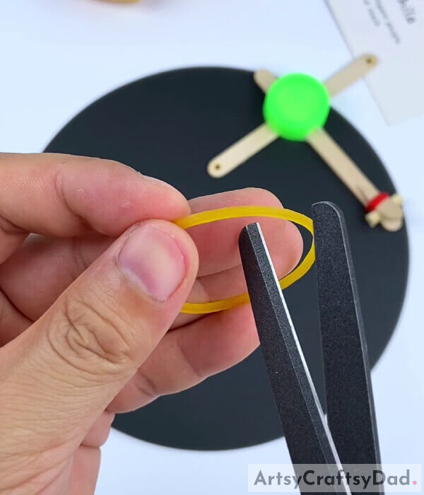 A Big Rubber Band - Tutorial for Constructing an Arrow & Bow Toy from Recycled Materials