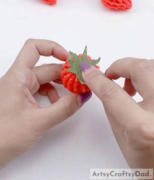 Cut out and paste the green, leafy part on the top - Crafting with Foam and Strawberries