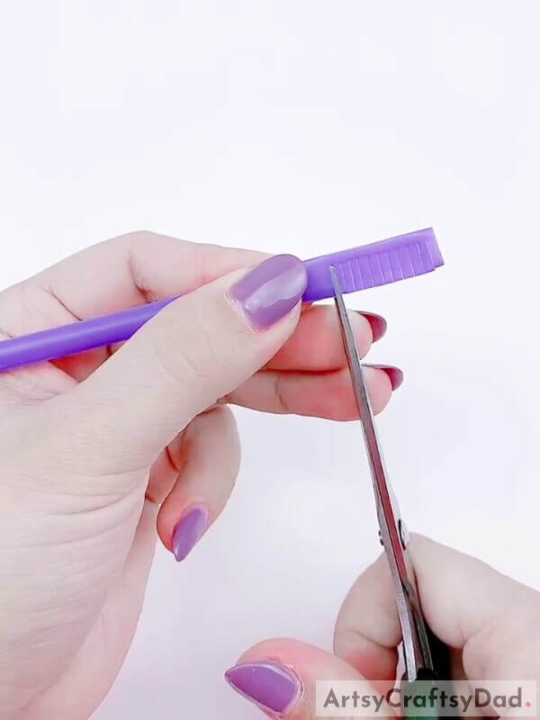 Cut out little stripes using a pair of scissors - How to Fabricate a Lavender Flower and Plastic Straw