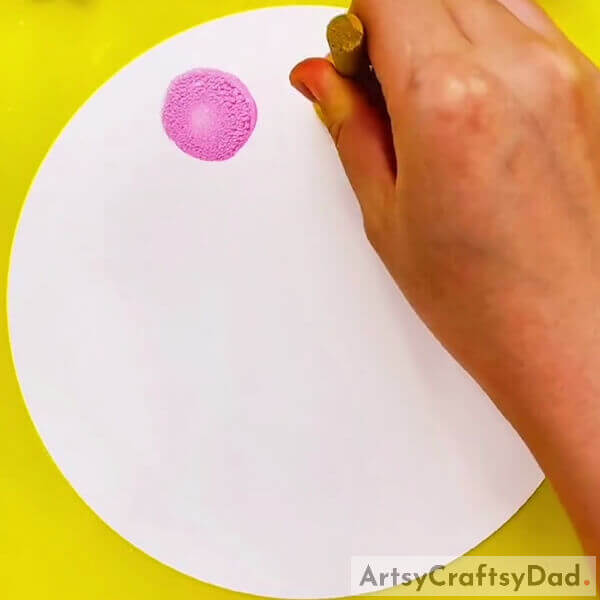 Dip the Circular Stamp in Pink Paint and Start Stamping - Creating a Circular Stamped Floral Arrangement: Artistic & Visual Guide