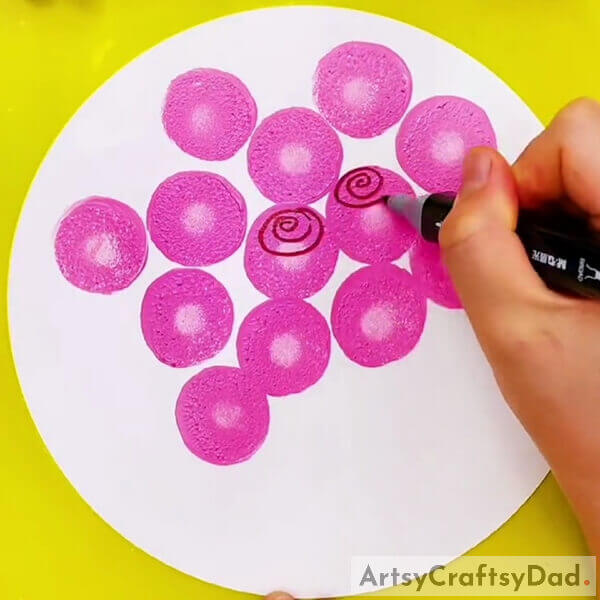 Draw the spiral petals on the Pink Circular roses - Artistic Guide to Making a Round Stamped Rose Bouquet