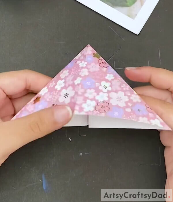 Fold According to Creases - A guide to creating a paper heart from origami paper for young people 