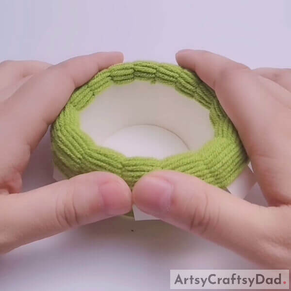 Fold Downwards - Tutorial for constructing a tiny woven basket from wool and paper