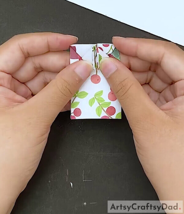 Fold The Corners - Step-By-Step Guide To Crafting A Paper Bow For Kids