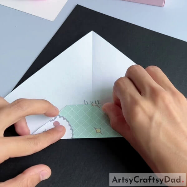Fold it further, inwards - Guide to create a paper origami sofa for youngsters