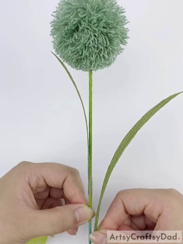 Make one more leaf - Design a Pom-Pom Posy with Wool Thread