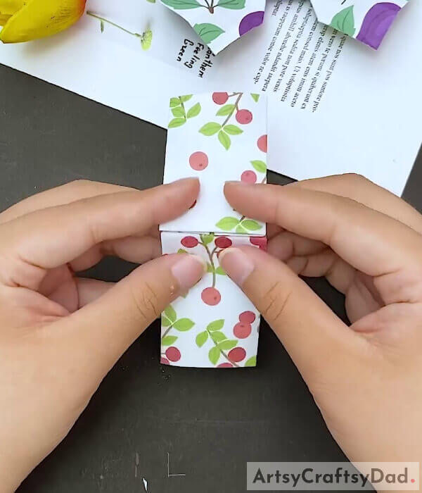 Open And Fold - Crafting An Origami Bow For Children