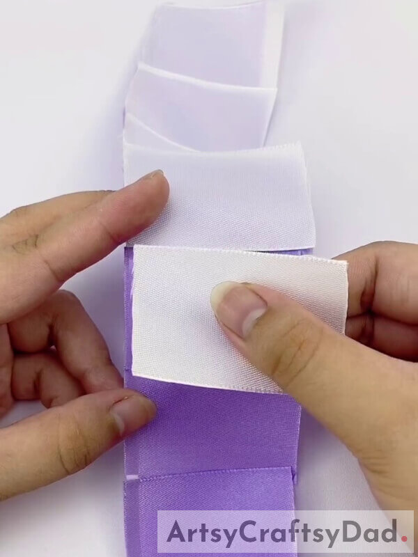 Paste White Ribbons on the Purple Ribbons - Detailed instructions to create a Purple Ribbon Pampas craft