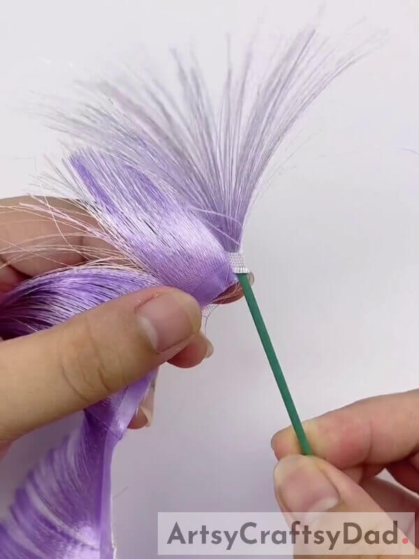 Roll the Fringed Ribbon around the Thin Stick - A Purple Ribbon Pampas Decoration tutorial