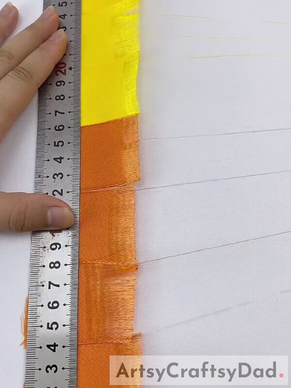 Scale - How to Make a Yellow-Orange Pampas Grass Decor Piece with Ribbon: A Tutorial 
