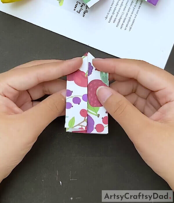Secure The Folds - Making A Paper Bow For Little Ones