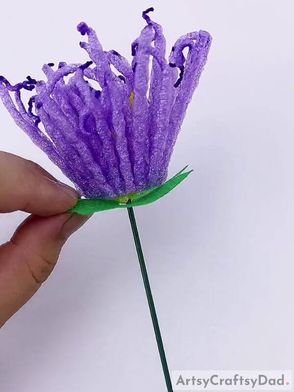 Take one of those designs and place it right below the flower - A tutorial on decorating a craft project with foam and purple fruits 