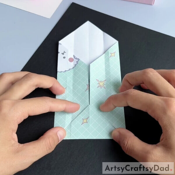 Undo the previous step. You might have gotten the crease - Explanation on constructing a paper origami sofa for children