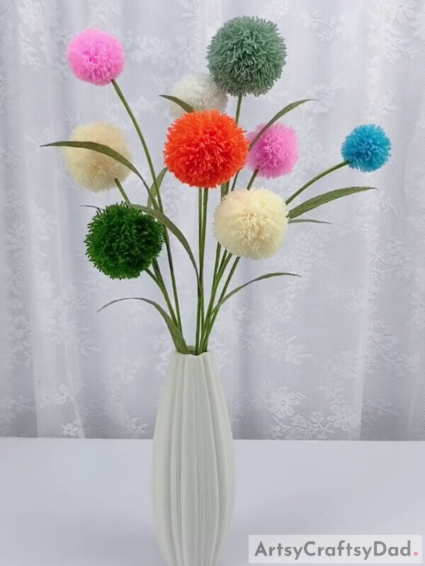 Final Image: Here. Wool Thread Pom-Pom Flowers are ready! - Discover How to Create a Pom-Pom Bouquet with Wool Thread
