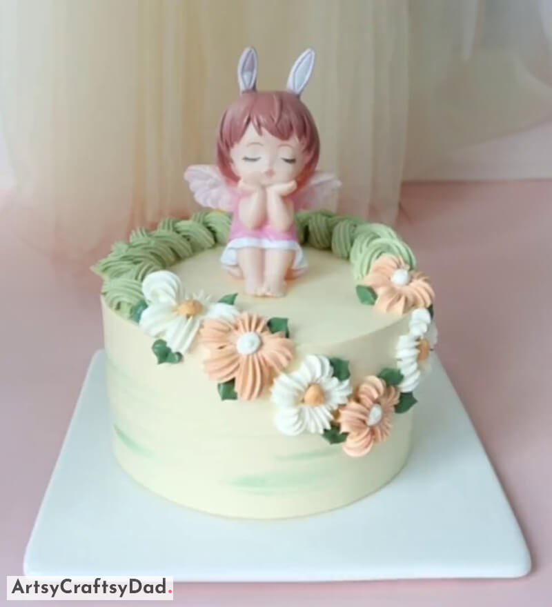 Annie Angel Baby Cake Topper Decoration With Colorful Flowers - Mouthwatering Birthday Cake Decorating Ideas For Youngsters