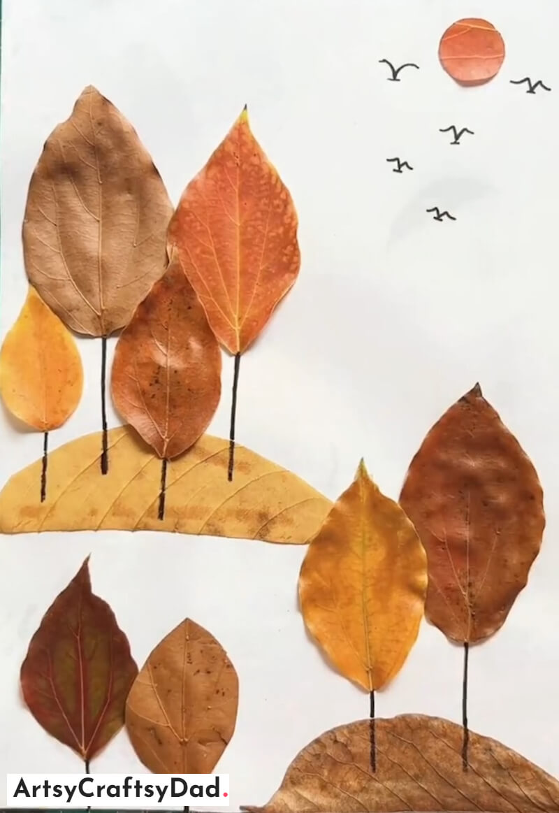 Beautiful Autumn Scenery Craft Idea with Fallen Leaves - Impressive DIY Leaf Crafts For Kids To Put Together